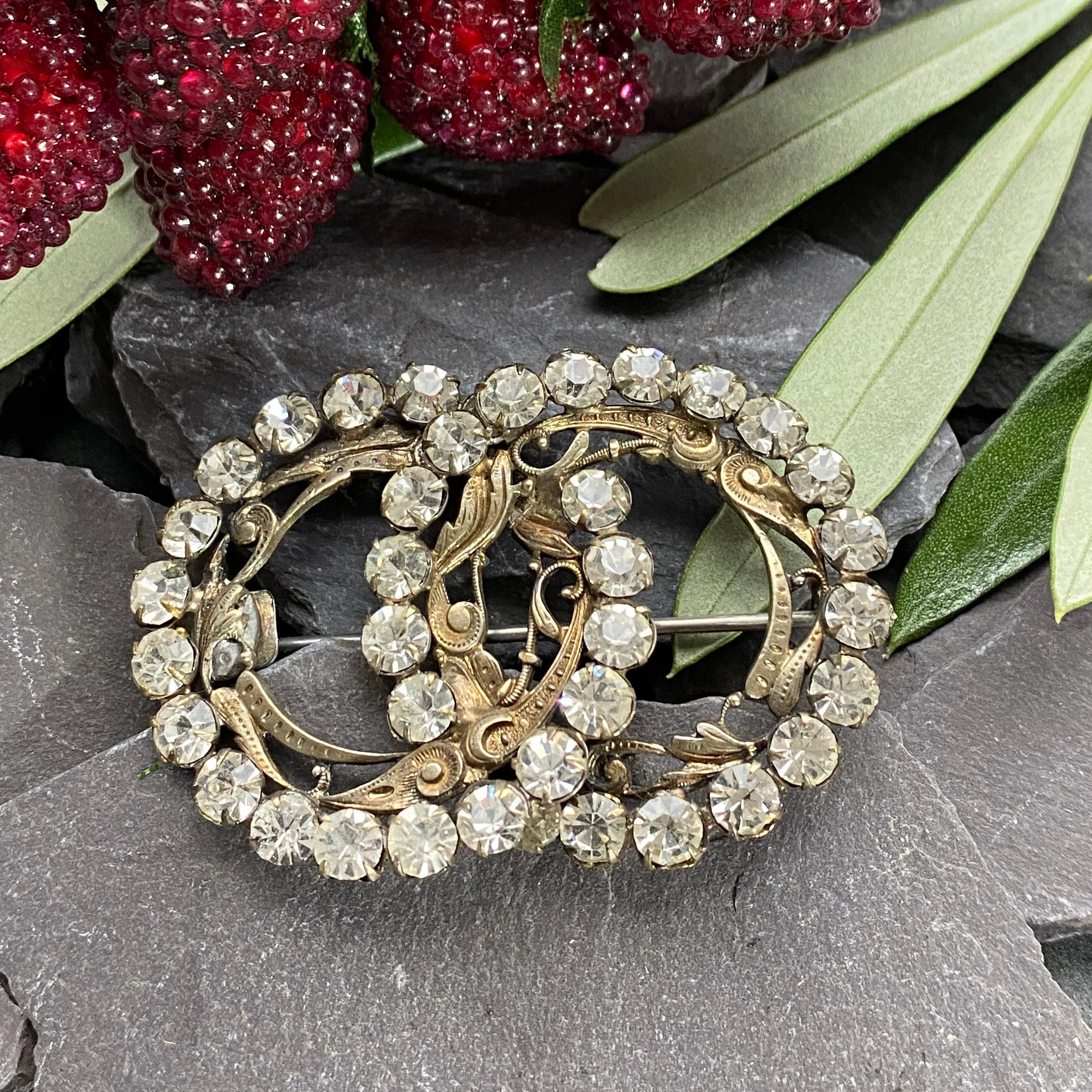 Antique Paste Costume Jewellery Scrolled Brooch.