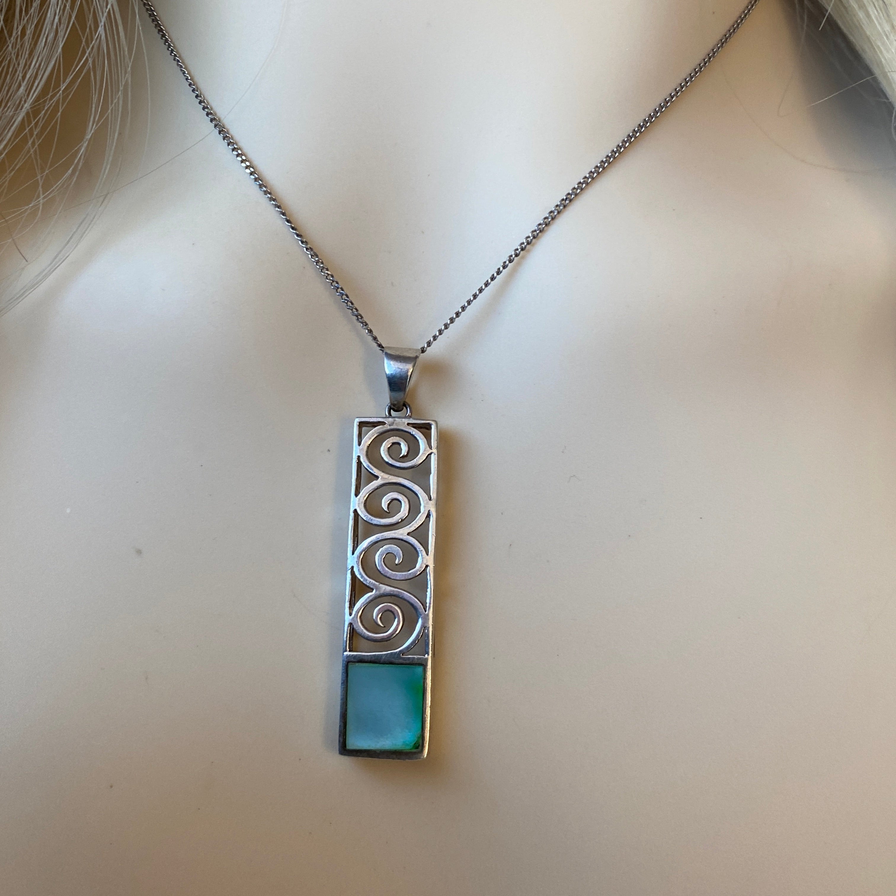 Sterling Silver & Mother of Pearl Pendant and 19 Inch Chain.