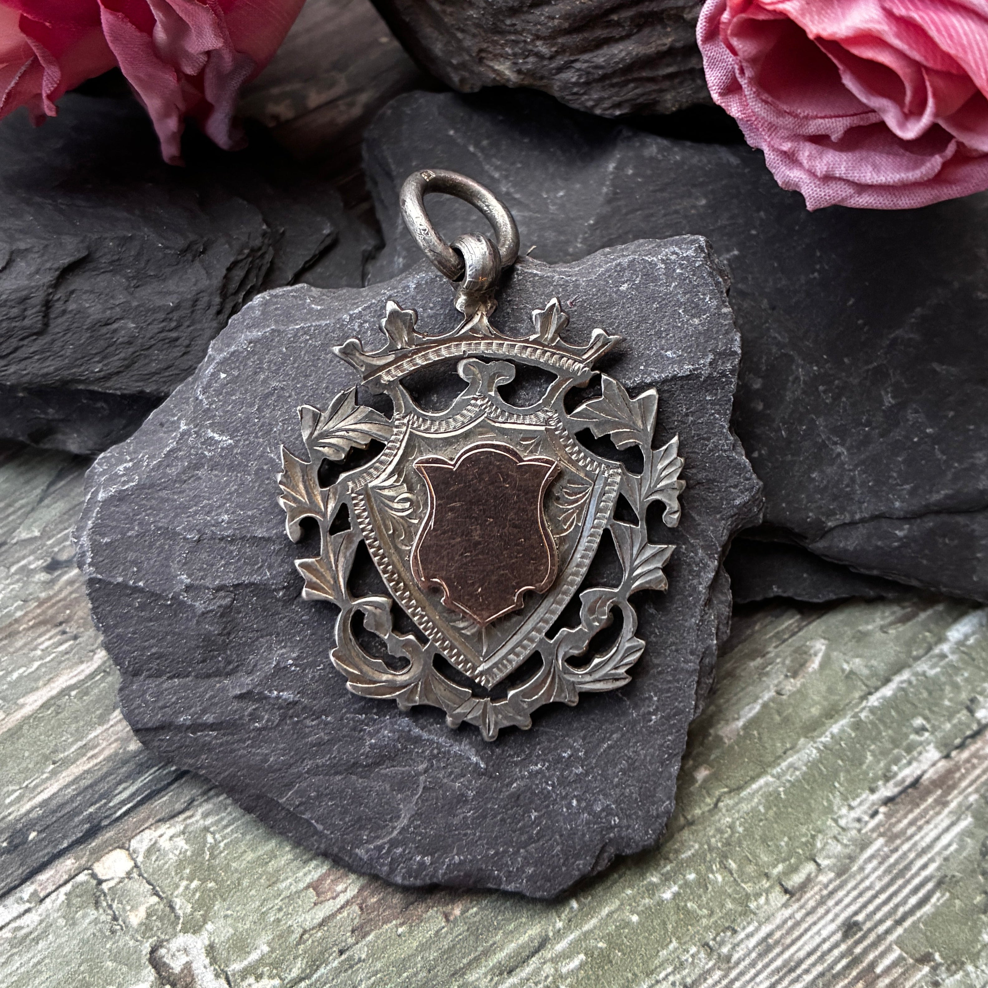 Antique sterling silver Albert fob medal awarded for football.