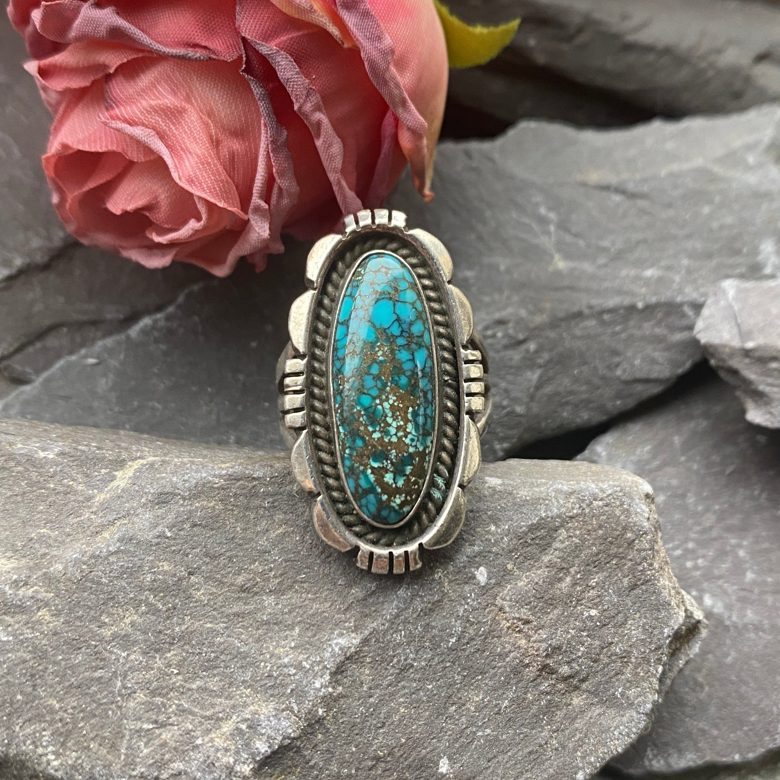 Navajo Silver ring with turquoise stone .