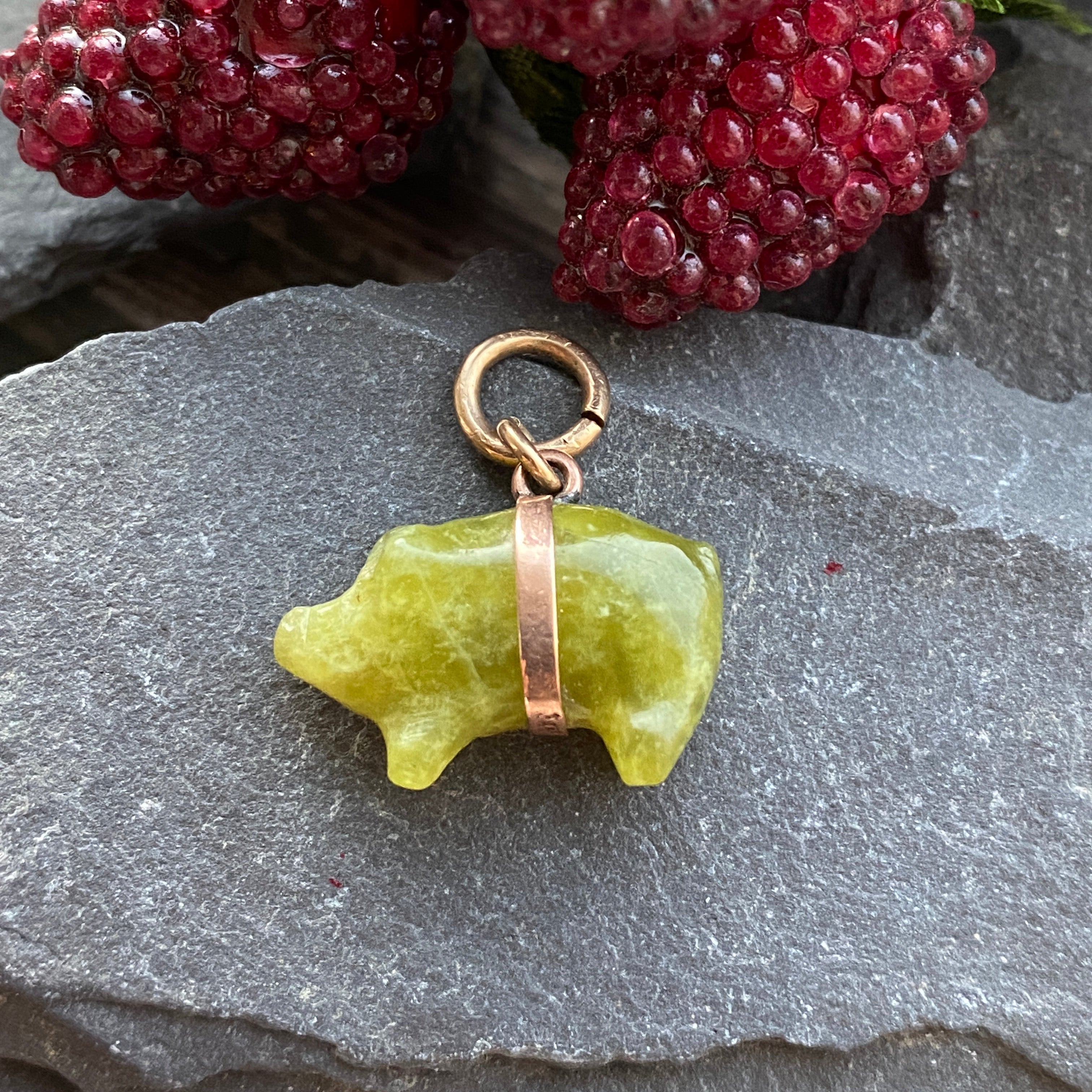 Connemara marble and 9ct gold pig pendant