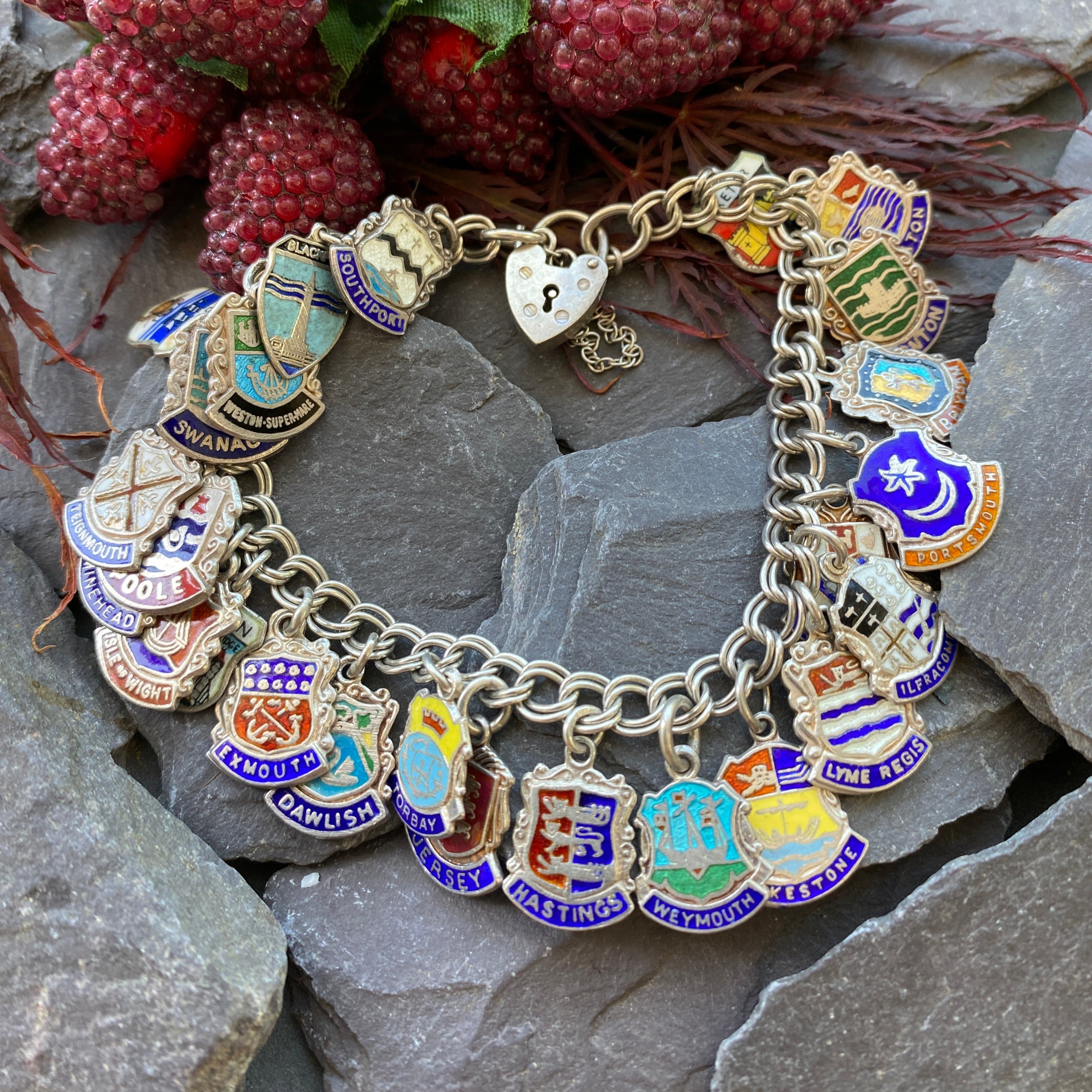 Vintage Silver Charm Bracelet With Enamel Shield Charms.