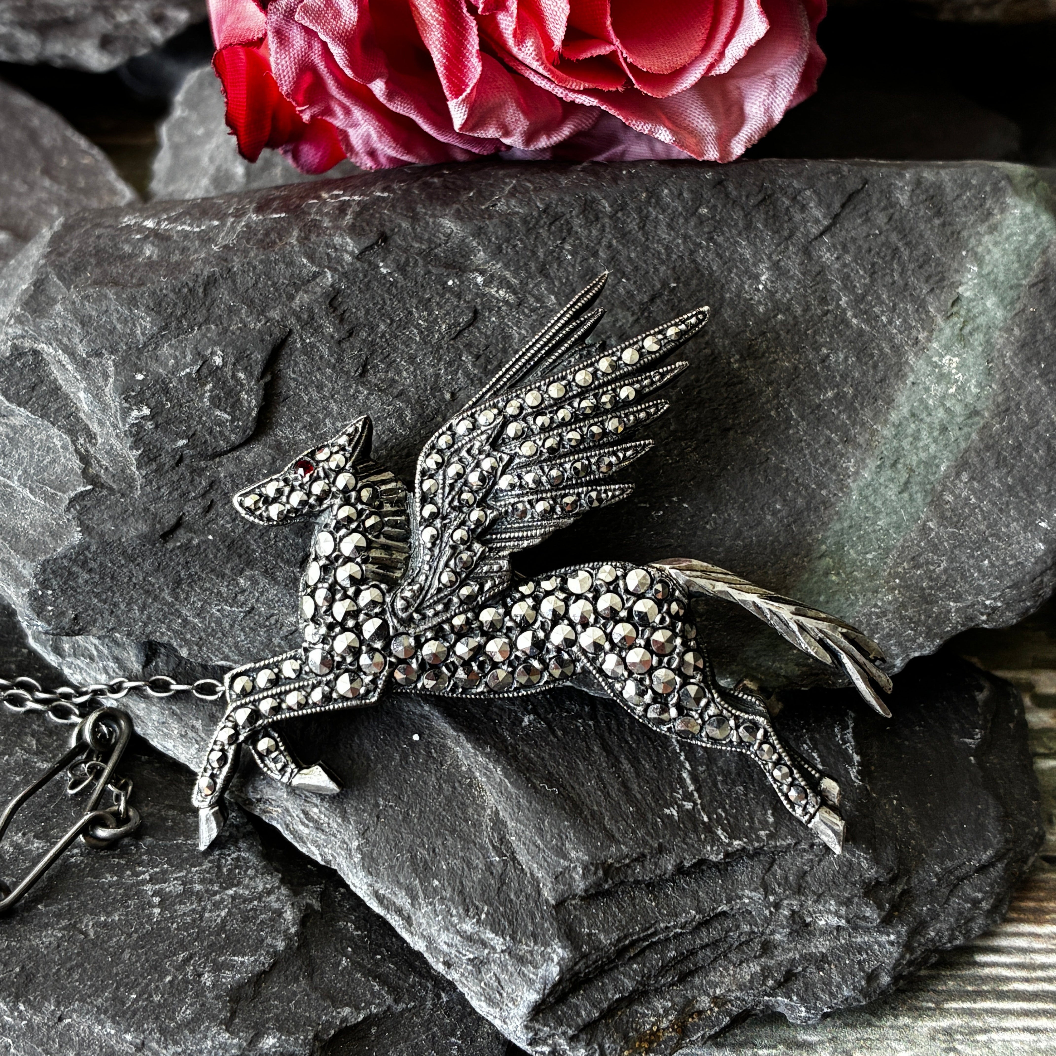 Vintage sterling silver Pegasus brooch with marcasite stones.