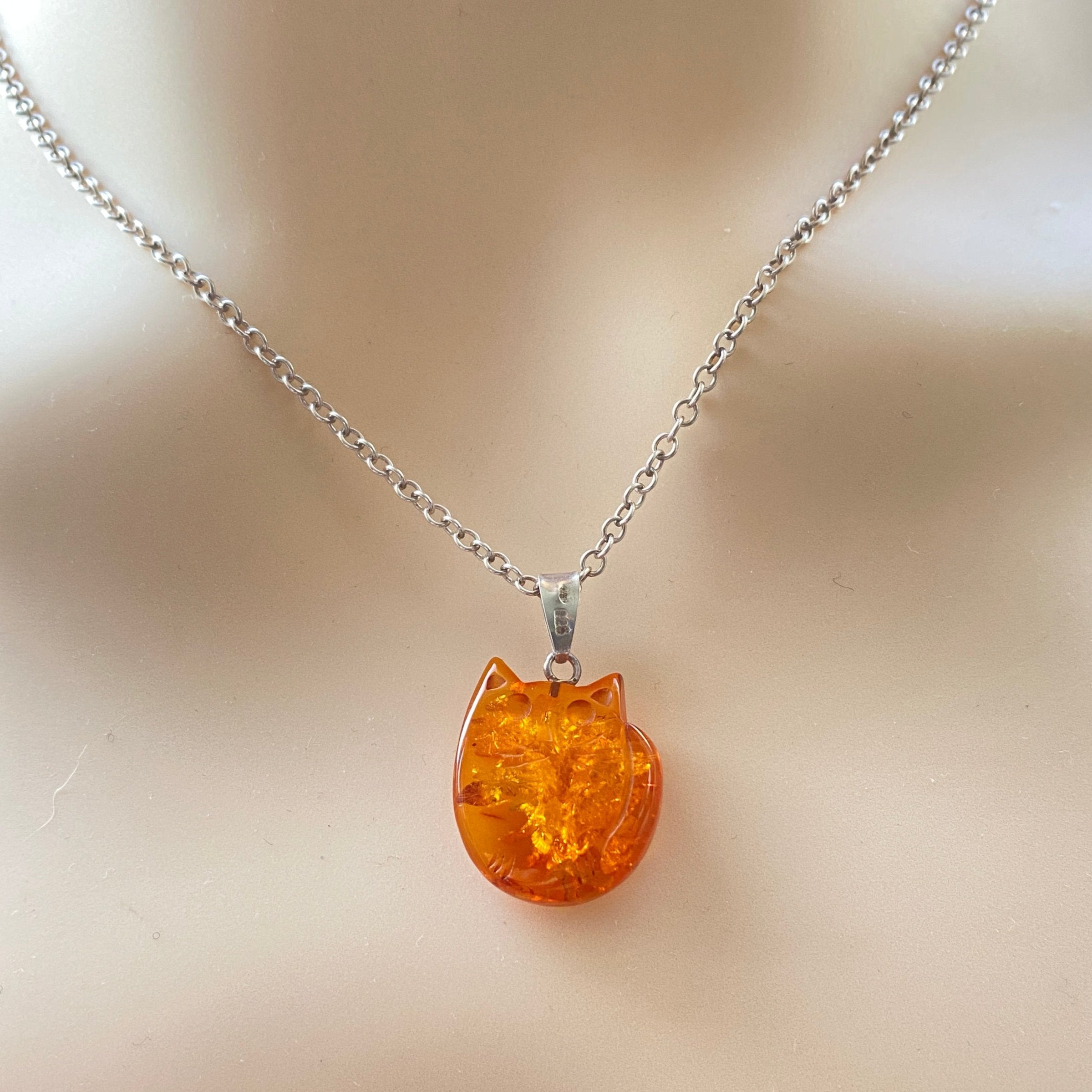 Silver & Carved Amber Cat Pendant And 18" Chain.