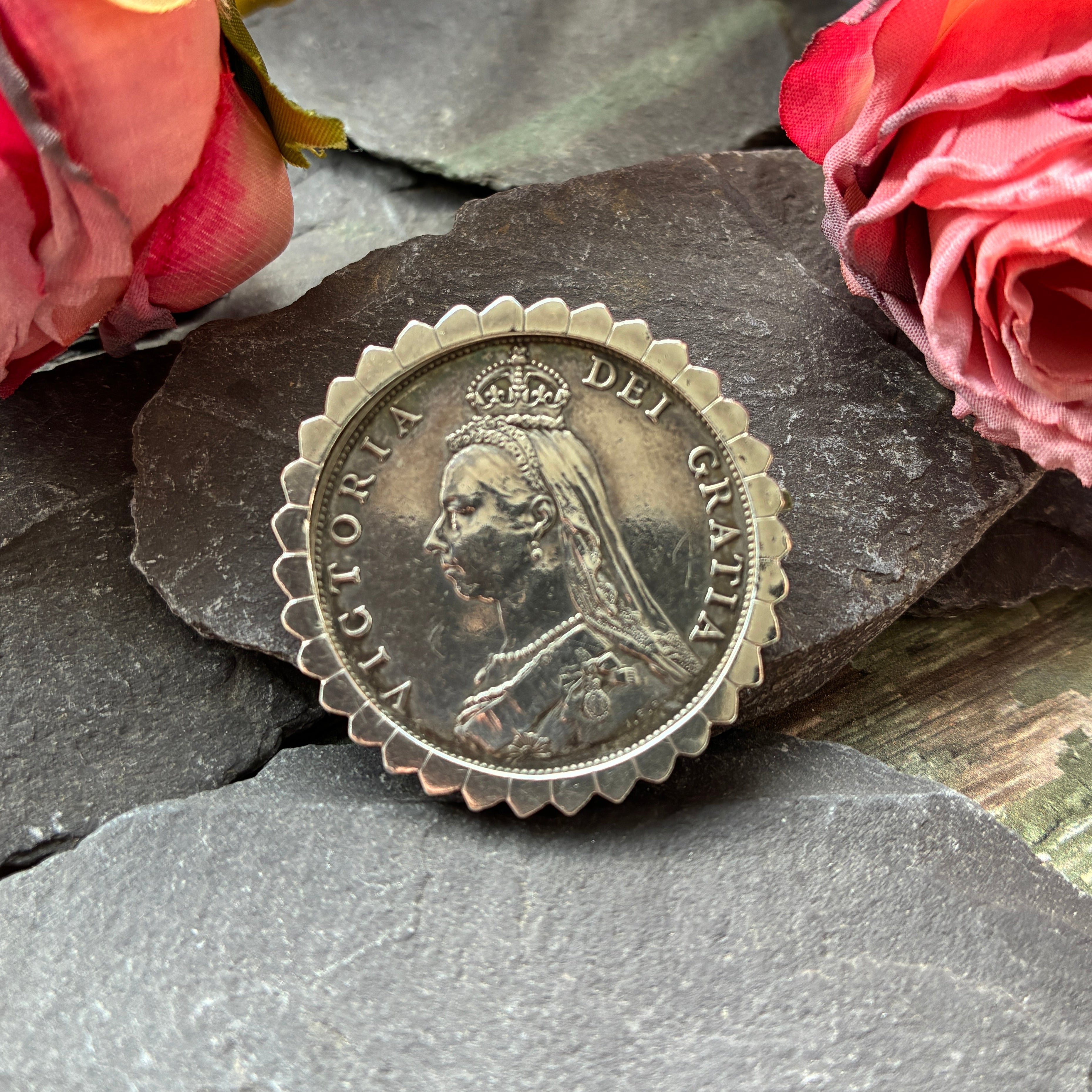 Antique Victorian florin coin mounted in sterling silver brooch.