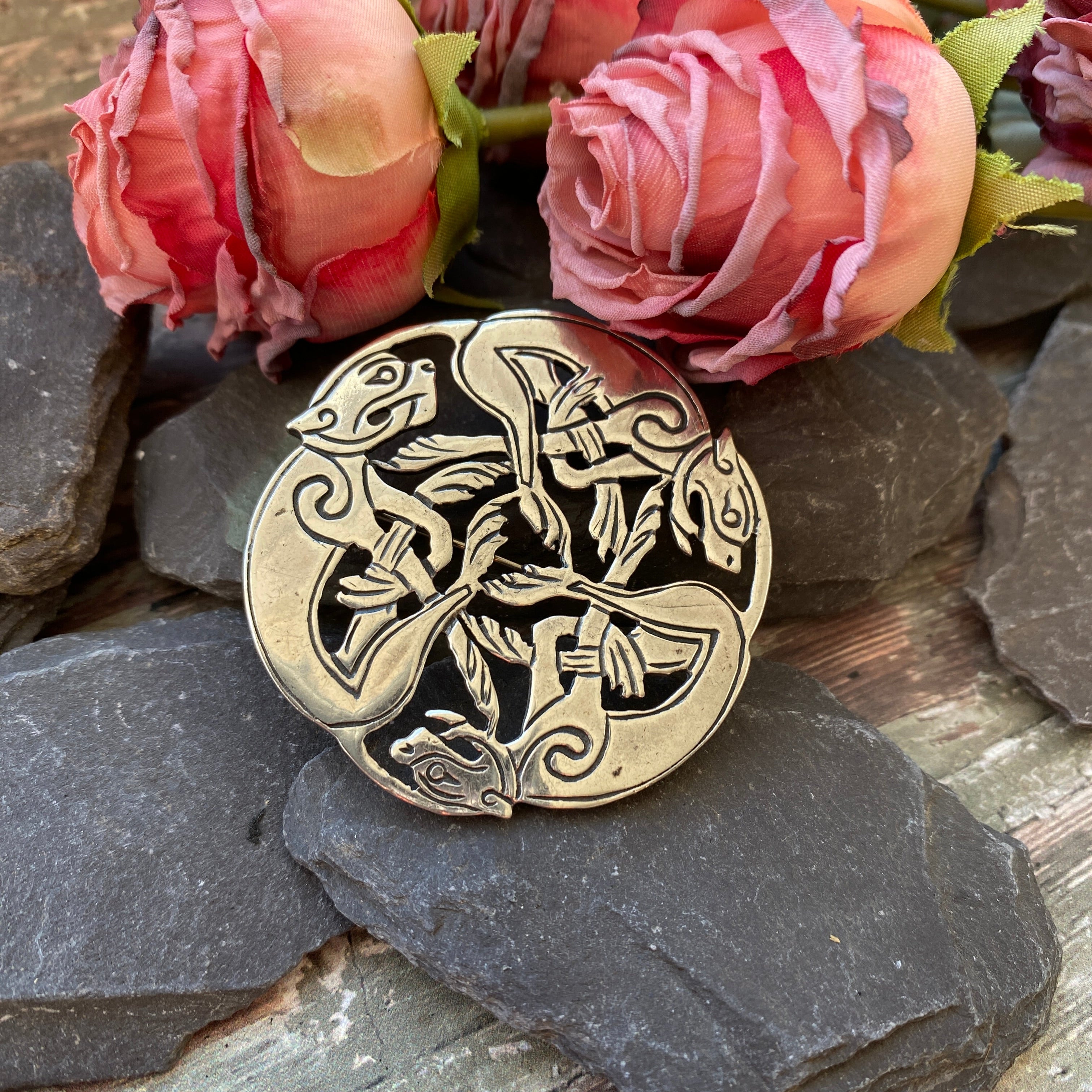 Irish chase of the hounds silver brooch.