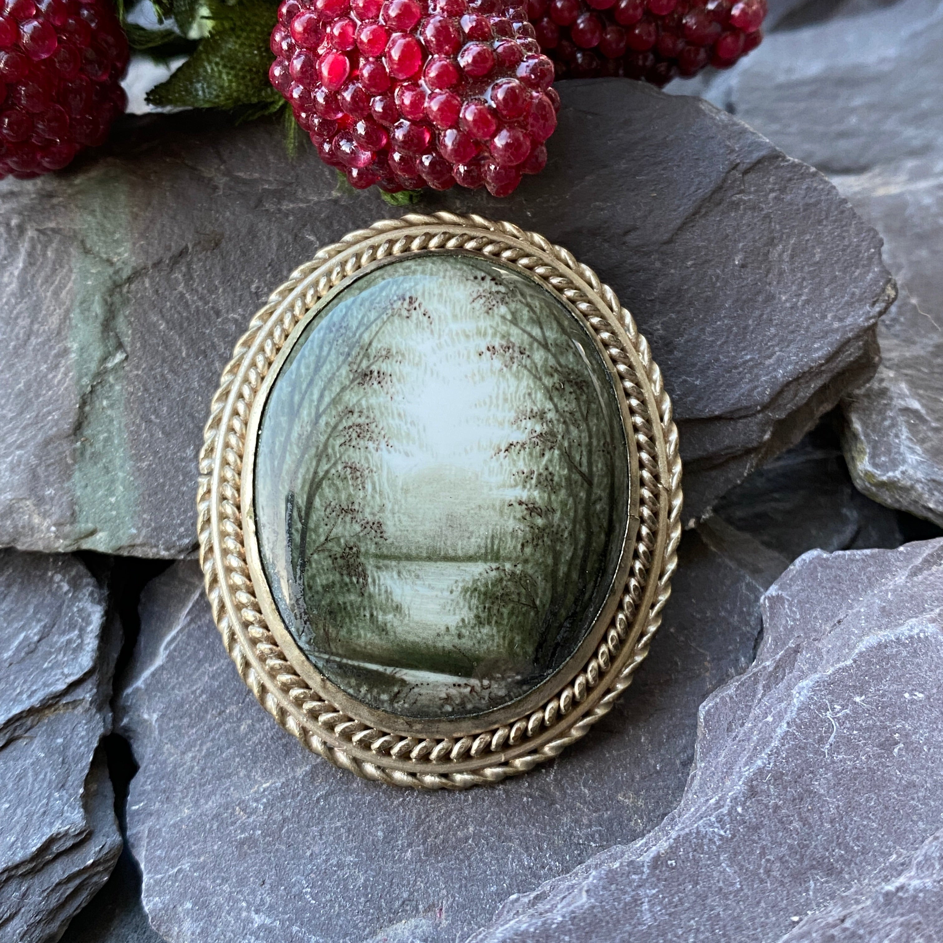 russian enamel brooch of forest scene