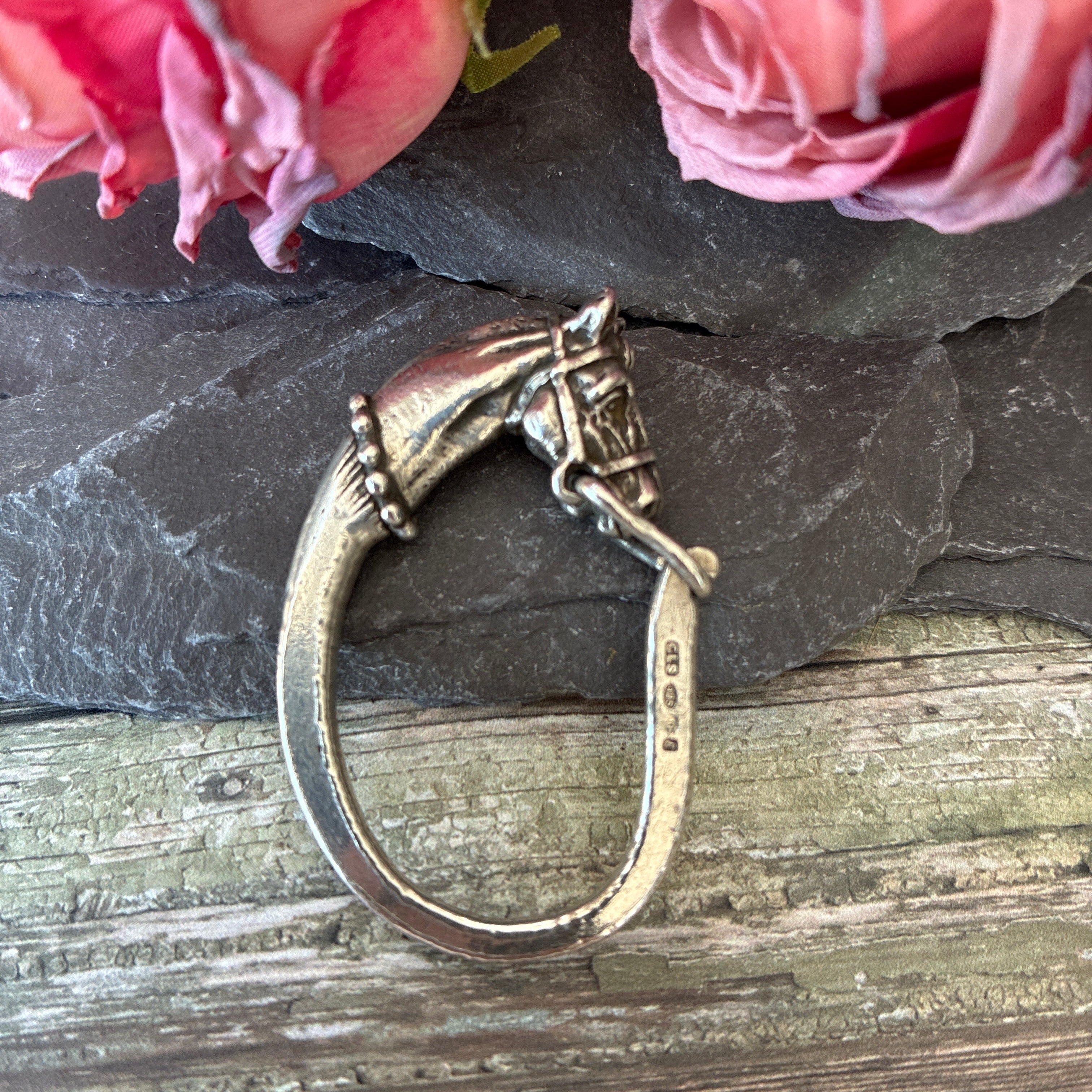Sterling silver horses head key fob clasp.