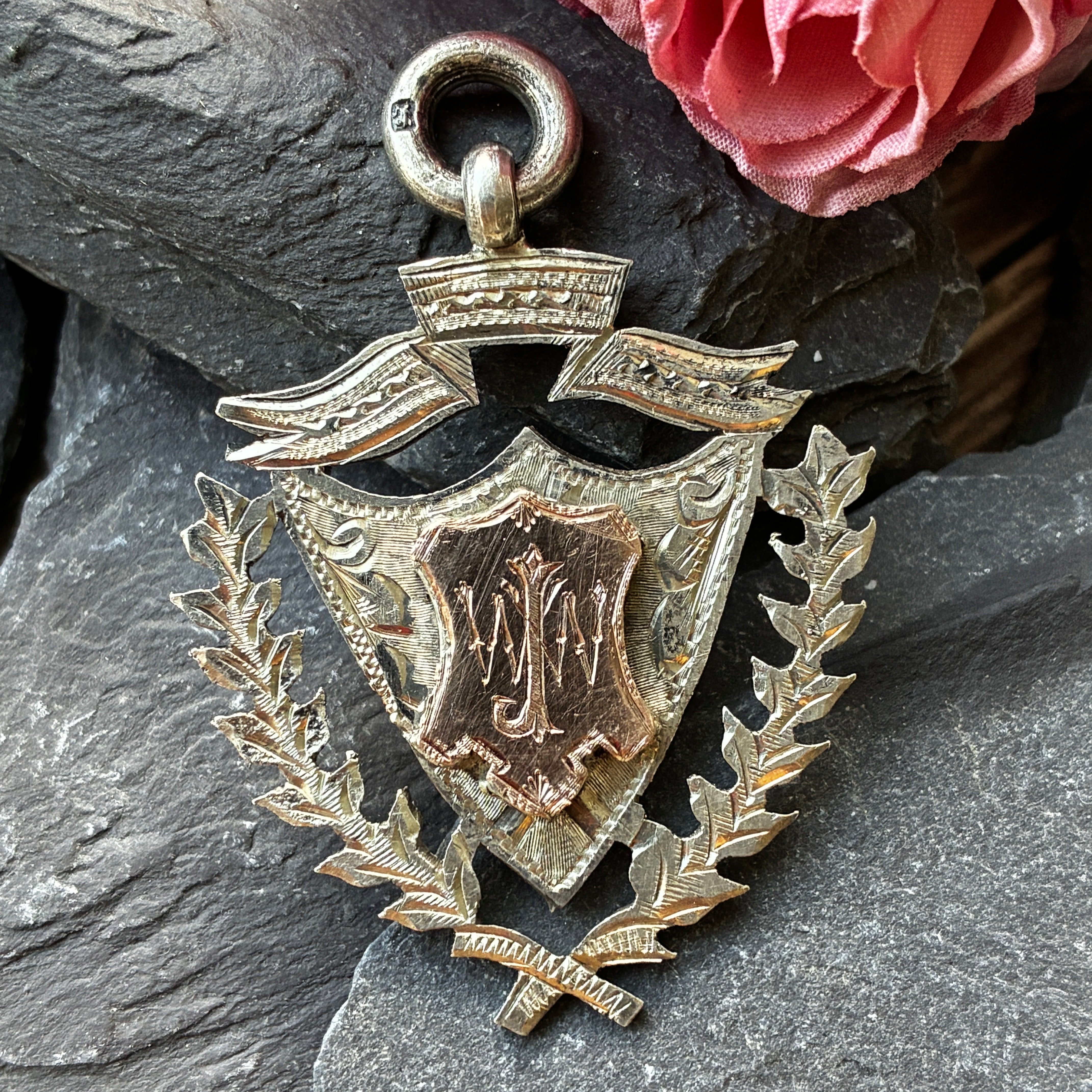 Victorian silver sporting medal fob. shield and laurel decoration