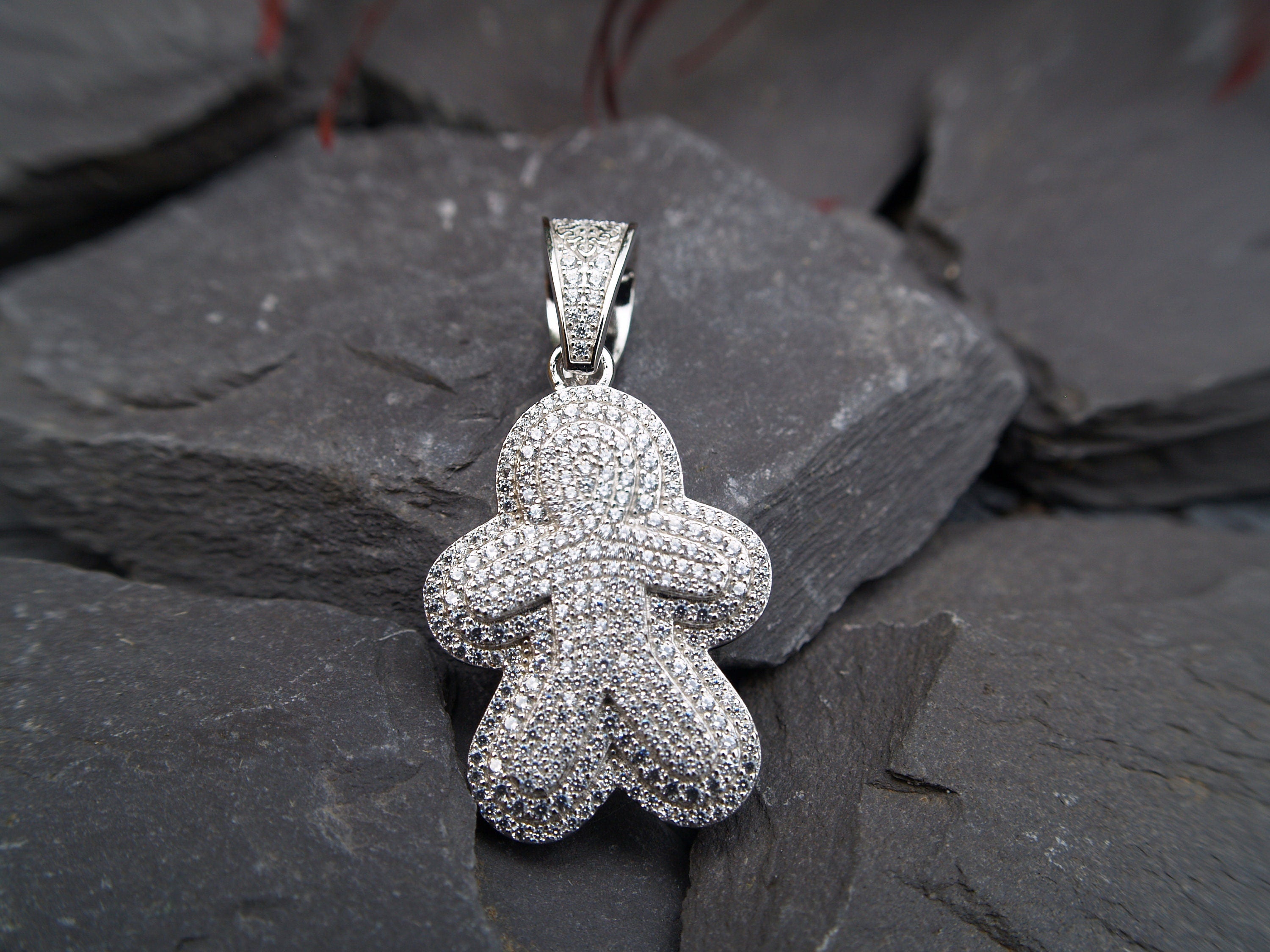 Sterling Silver Figure Pendant Set with Cubic Zirconia.