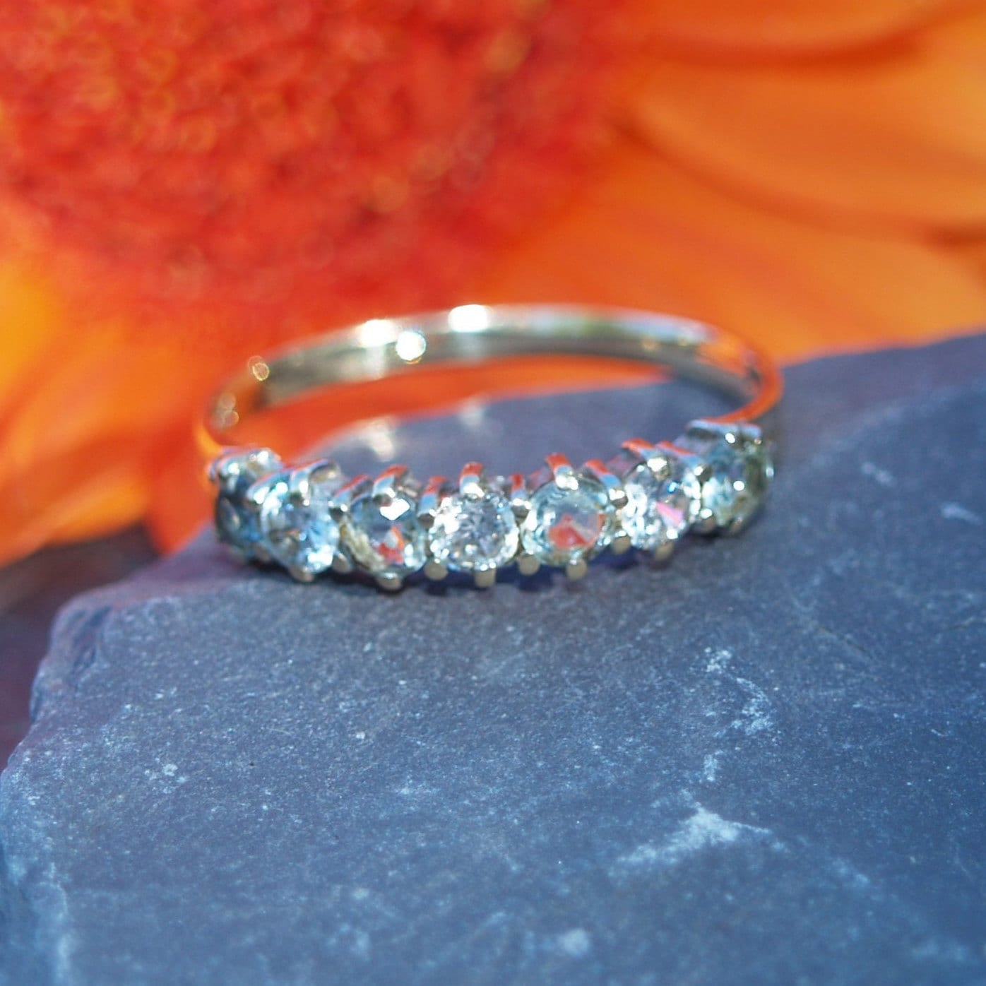 9ct Gold Eternity Ring Set With Cubic Zirconia In A Half Hoop Setting Size Q 1/2 or 8 1/2 US.