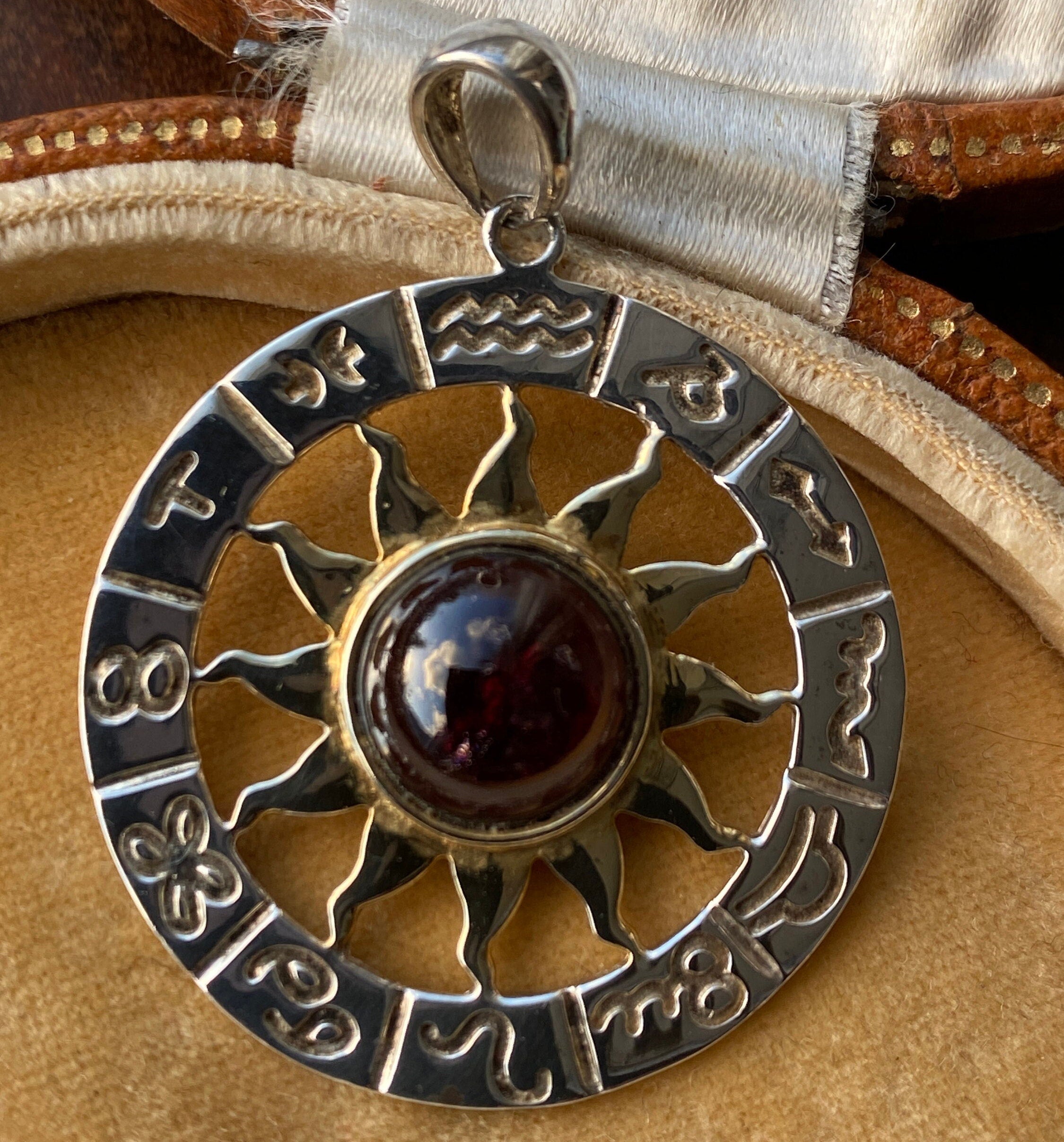 Silver & Garnet Zodiac Sun Pendant in Sterling Silver with Gilded Sun.