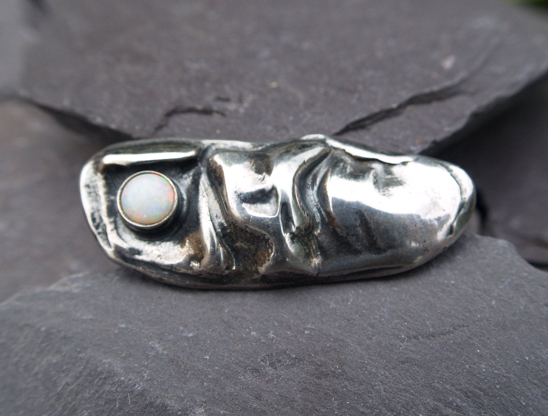 Sterling Silver And Opal Abstract Brooch .