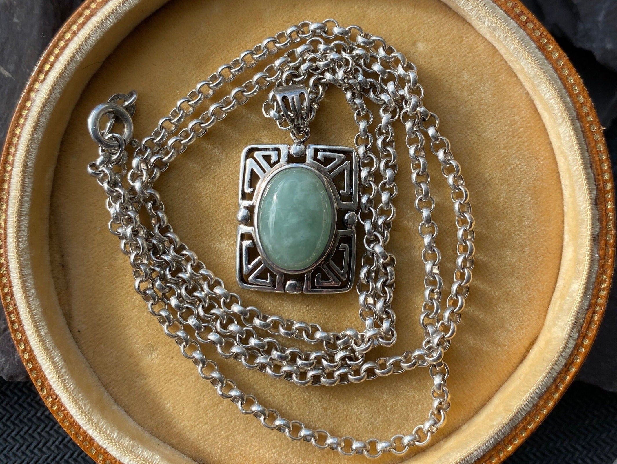 Sterling Silver & Jade Pendant and 23 Inch Chain.