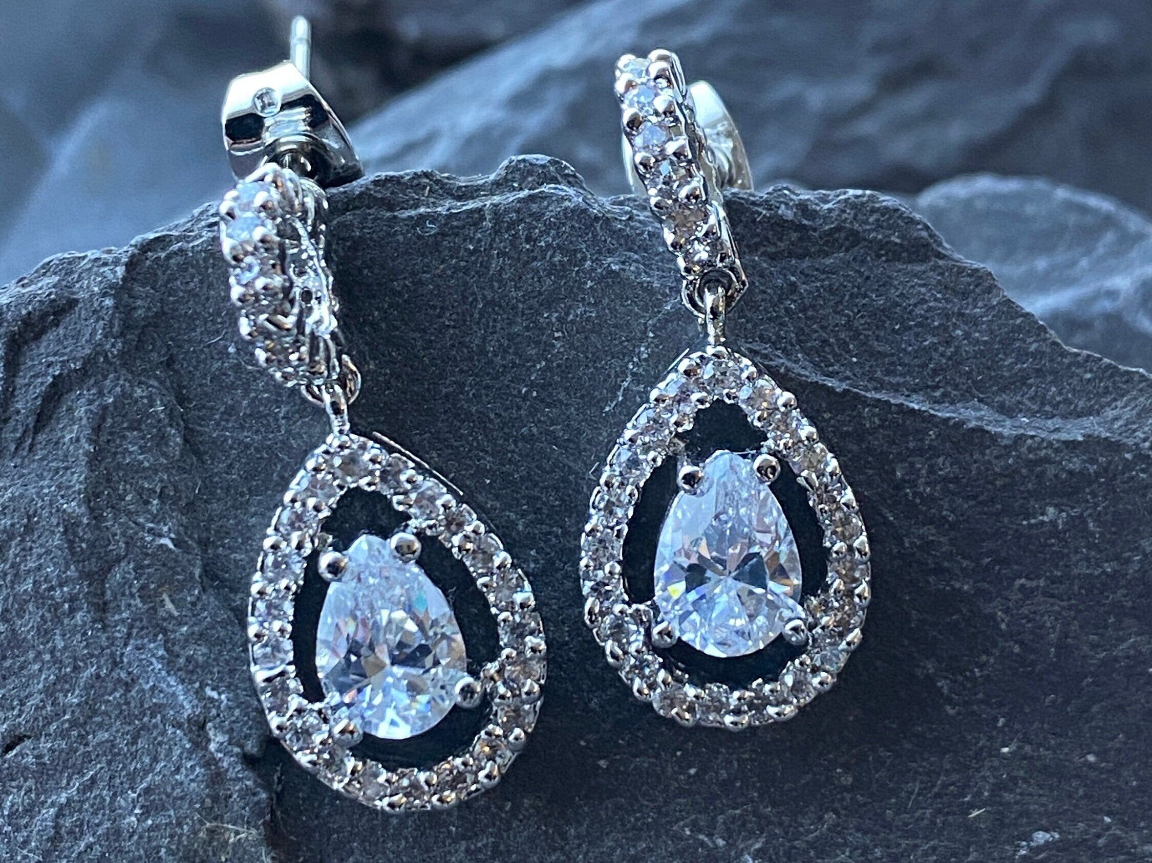 Rhodium Plated Cubic Zirconia Drop Earrings.