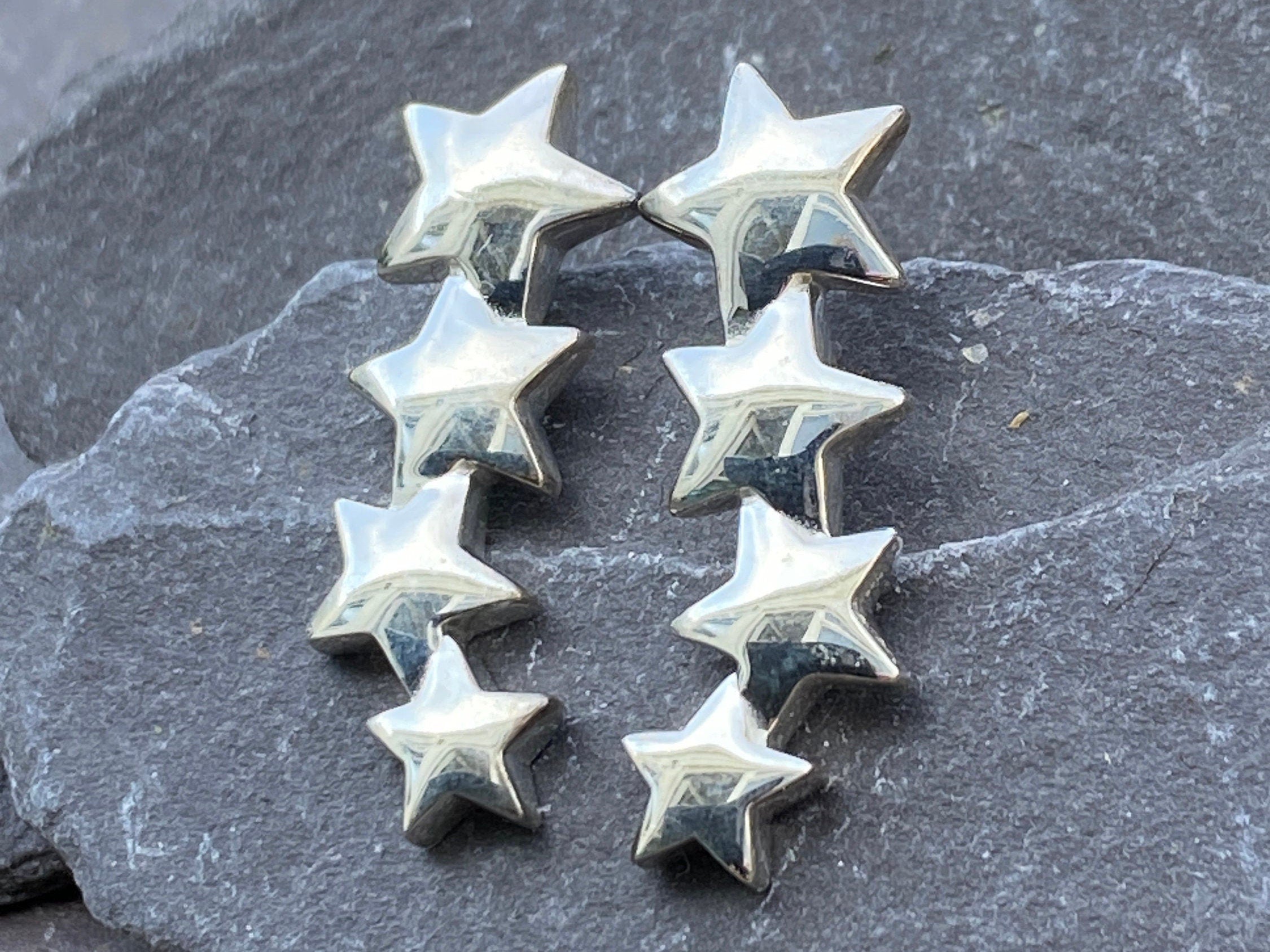 Sterling Silver Star Drop Earrings.